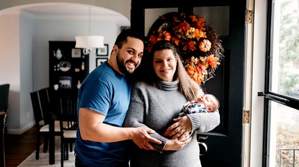 Eric and Brienne Alves hold their son, Noah.