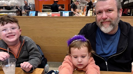 Gordon Dakin (right) with his two children