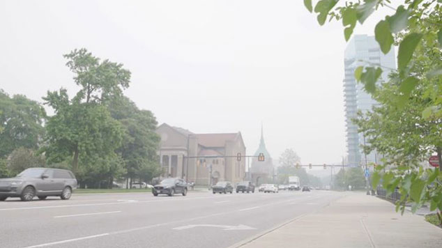 Cars in traffic on a gloomy day in Cleveland.